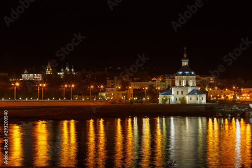 old town in Cheboksary with reflections on the water  shot on an autumn evening