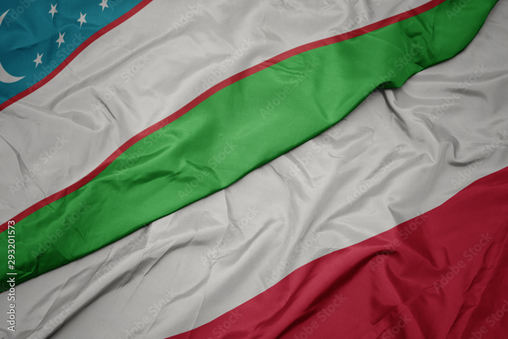 waving colorful flag of poland and national flag of uzbekistan.