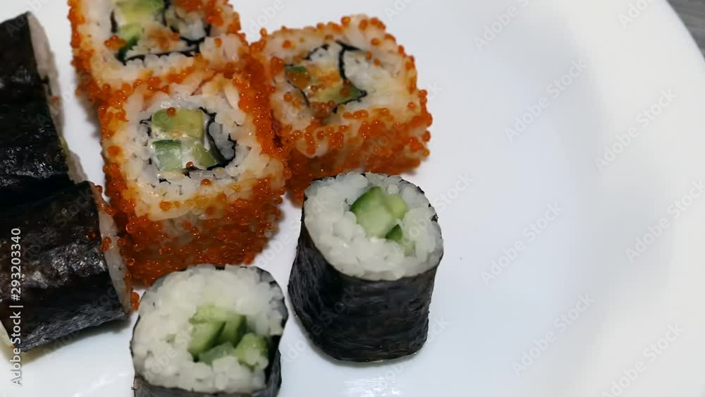 Top View Fresh Sushi On White Plate Panning Slider Shot. Top View Fresh Sushi On White Plate Panning Slider Shot.