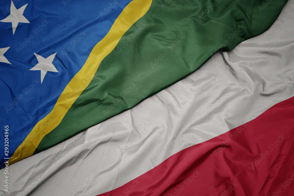 waving colorful flag of poland and national flag of Solomon Islands .