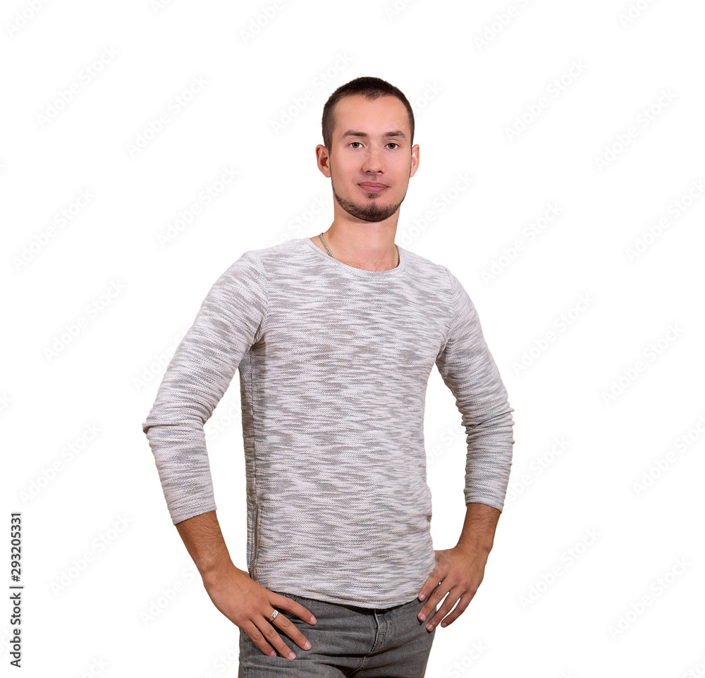Fototapeta premium young man stands on a white background isolated