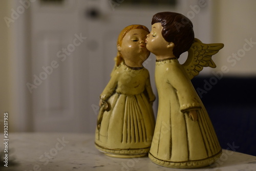 Boy and Girl Angels Kissing