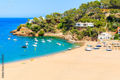 View of sandy beach in Sa Riera coastal fishing village, Costa Brava, Catalonia, Spain