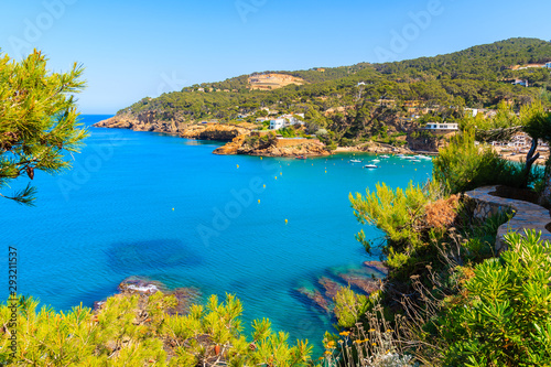 View of bay with azure sea water in beautiful Sa Riera village, Costa Brava, Catalonia, Spain