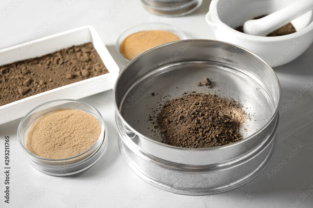 Laboratory equipment for pulverizing and sieving of soil samples on light table Laboratory equipment for pulverizing and sieving of soil samples on light table