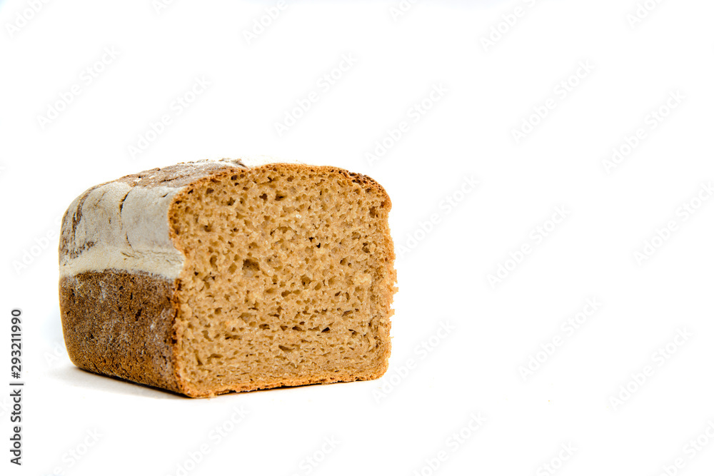 Dark bread isolated on a white background. The concept of baking bread, eating meals with rolls, bread. Product made of wheat and rye flour, bread preparation. Dark bread isolated on a white background. The concept of baking bread, eating meals with rolls, bread. Product made of wheat and rye flour, bread preparation.