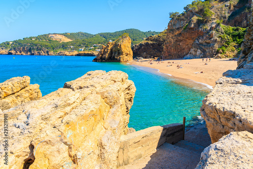 Path to Cala Moreta beach and view of blue sea and rocks, Costa Brava, Catalonia, Spain