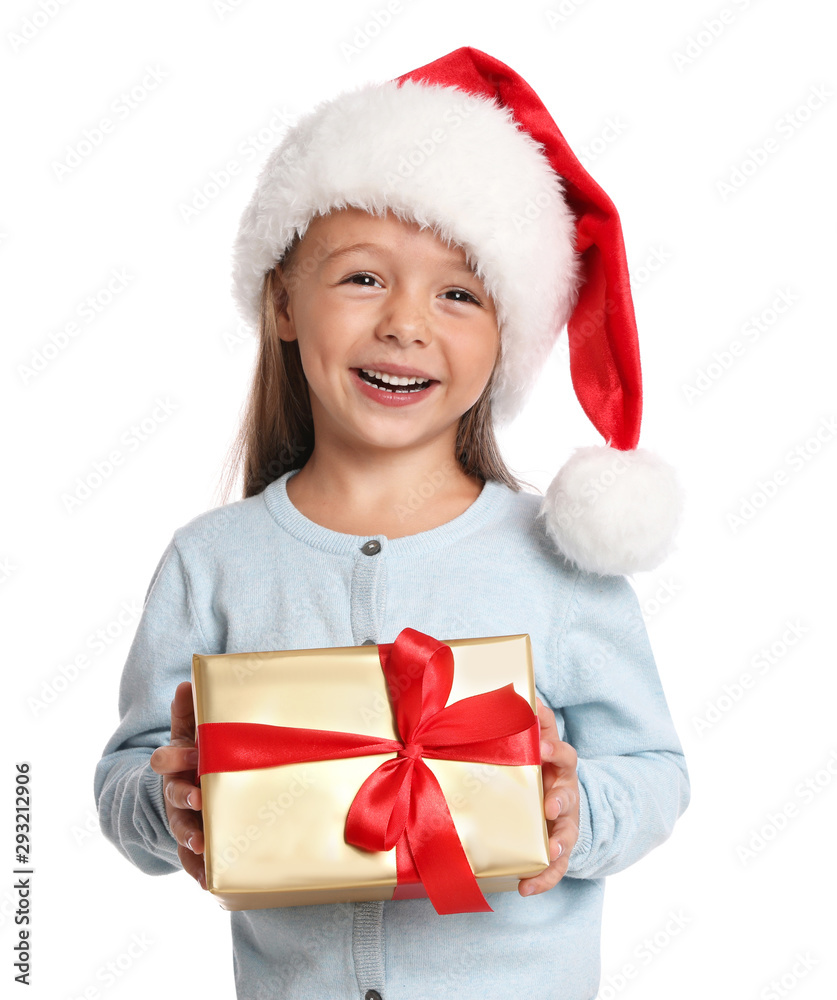 Happy little child in Santa hat with gift box on white background. Christmas celebration Happy little child in Santa hat with gift box on white background. Christmas celebration