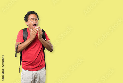 Friendly young man doing a gesture of keep calm