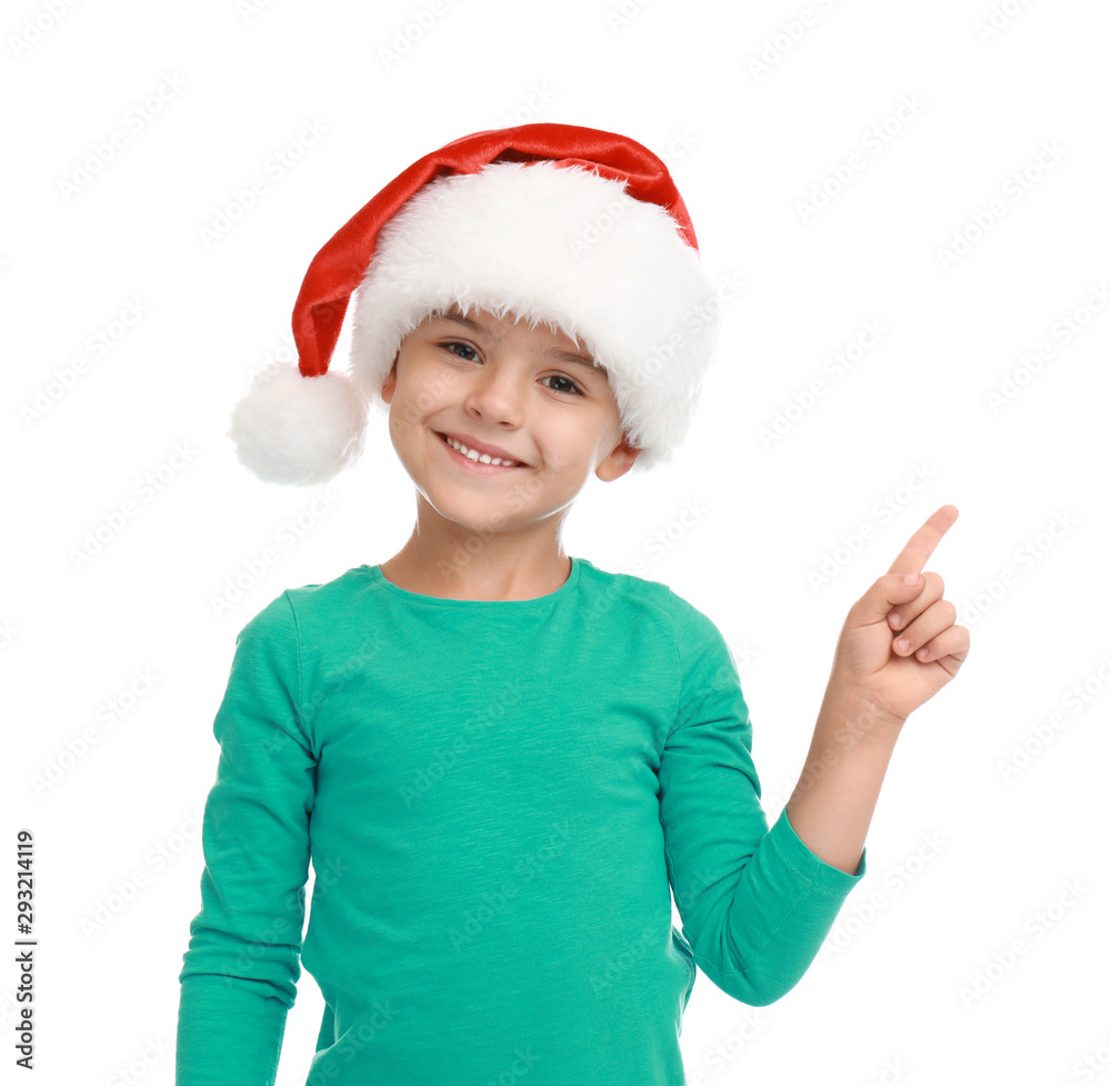 Cute little child wearing Santa hat on white background. Christmas holiday Cute little child wearing Santa hat on white background. Christmas holiday