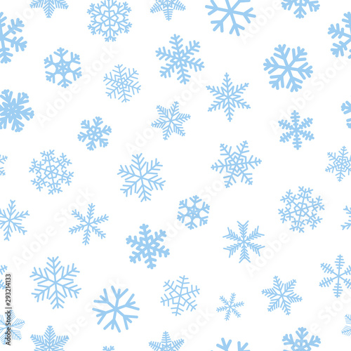 Christmas seamless pattern of snowflakes, light blue on white background