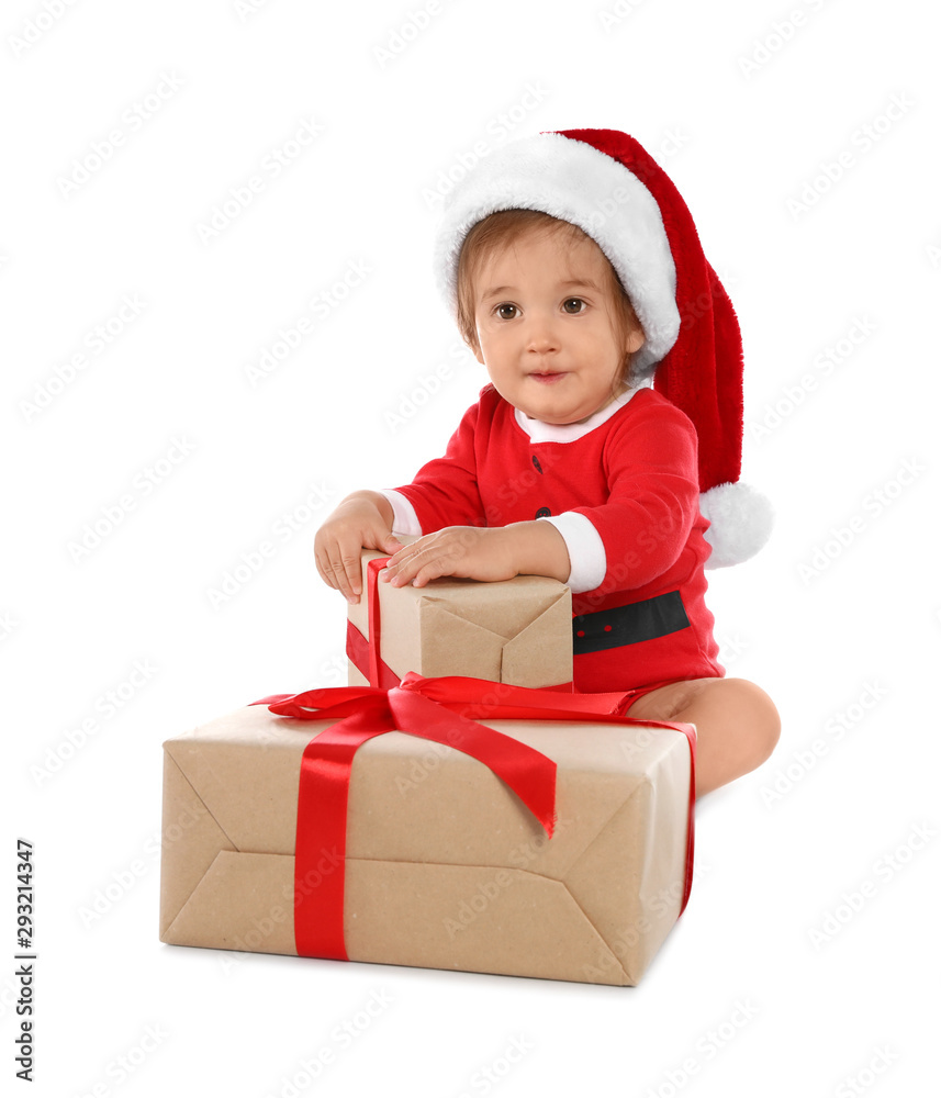 Festively dressed baby with gift boxes on white background. Christmas celebration Festively dressed baby with gift boxes on white background. Christmas celebration