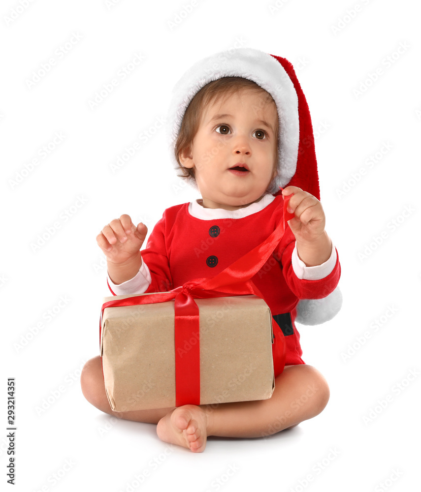 Festively dressed baby with gift box on white background. Christmas celebration Festively dressed baby with gift box on white background. Christmas celebration