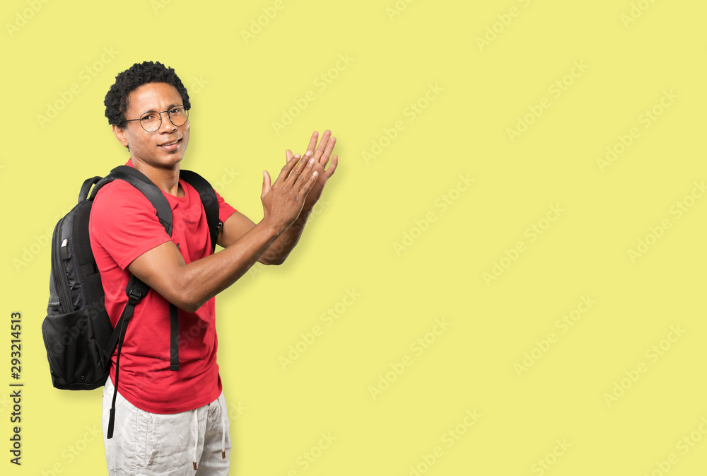 Concerned young man with a gesture of disgust Concerned young man with a gesture of disgust