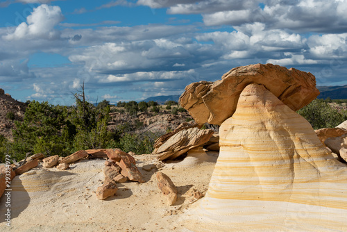landscape of striped yellow rock formation in the Ojito Wilderness of New Mexico photo