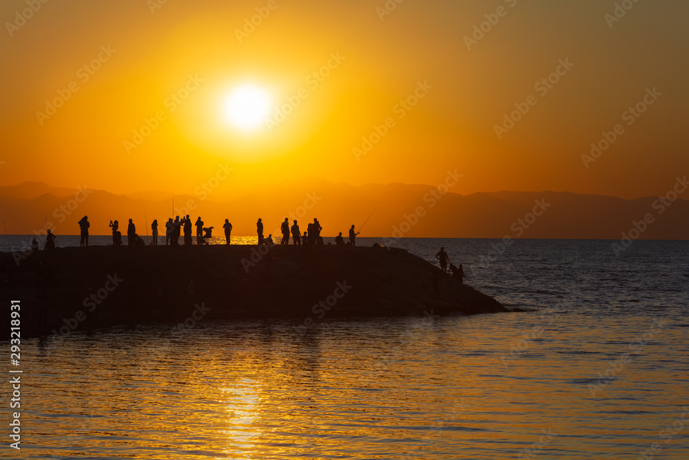 People enjoying sunset