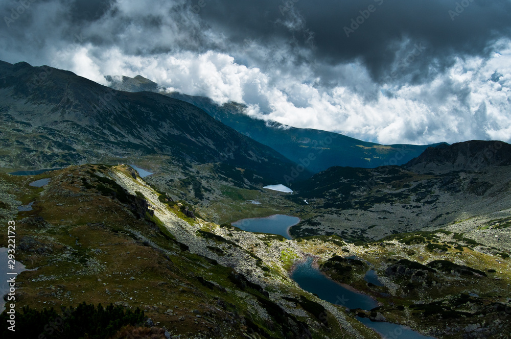 High-altitude landscape with glacier lakes from the Retezat Peak of the Carpathian Mountains  