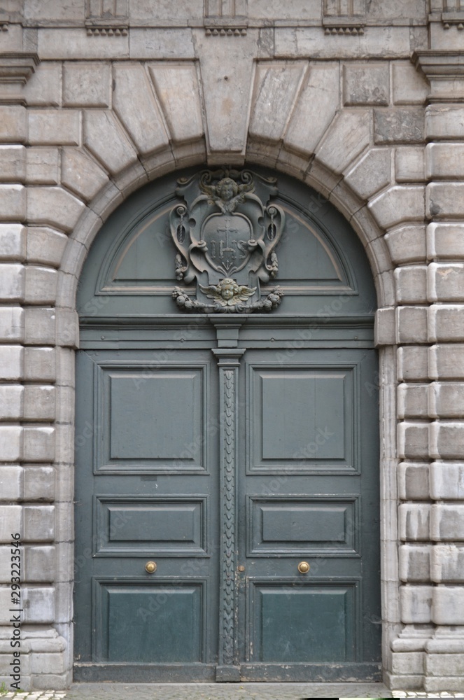Old closed door - architectural detail from Antwerp, Belgium