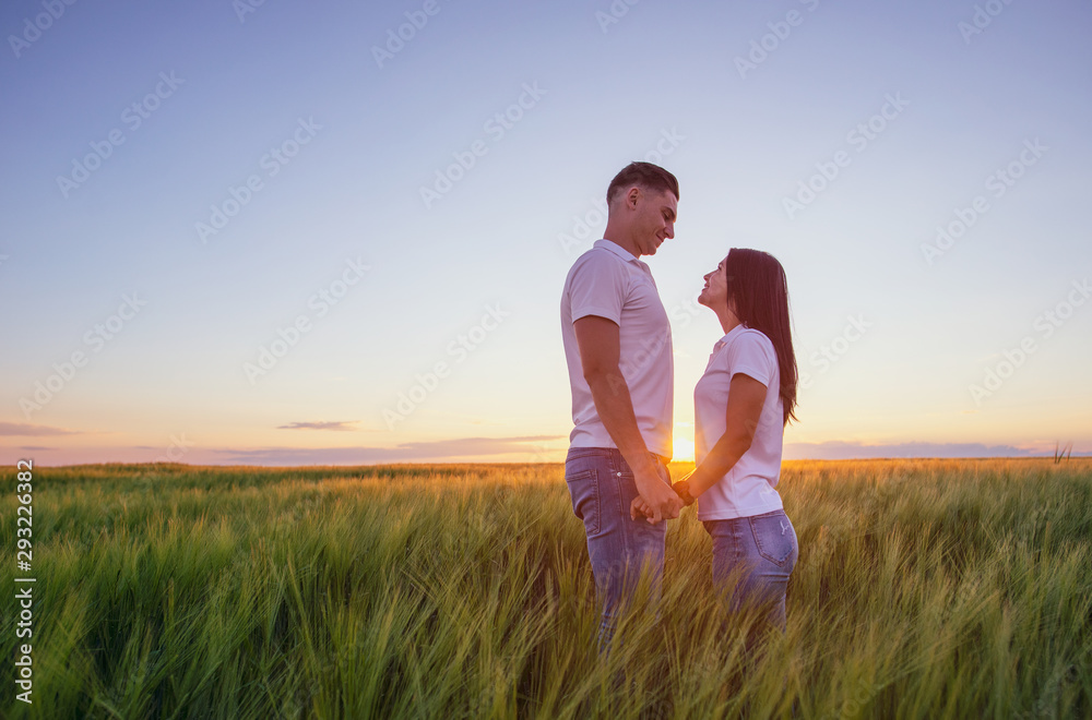 Love Couple in  romantic summer field