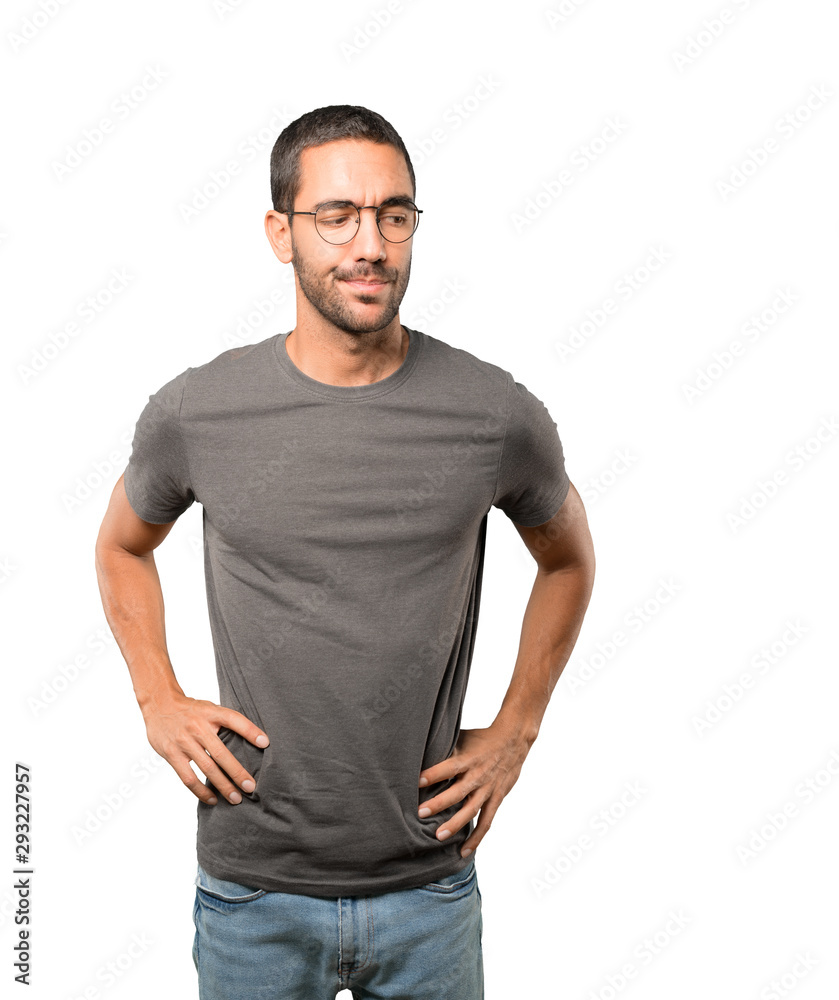 Serious young man with a gesture of disappointment Serious young man with a gesture of disappointment