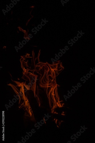 Abstract fire. Abstract flame on a black background. Beautiful texture of fire in the dark.