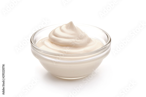 Bowl of sour cream, isolated on white background
