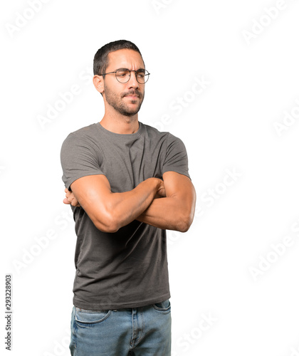 Angry young man posing