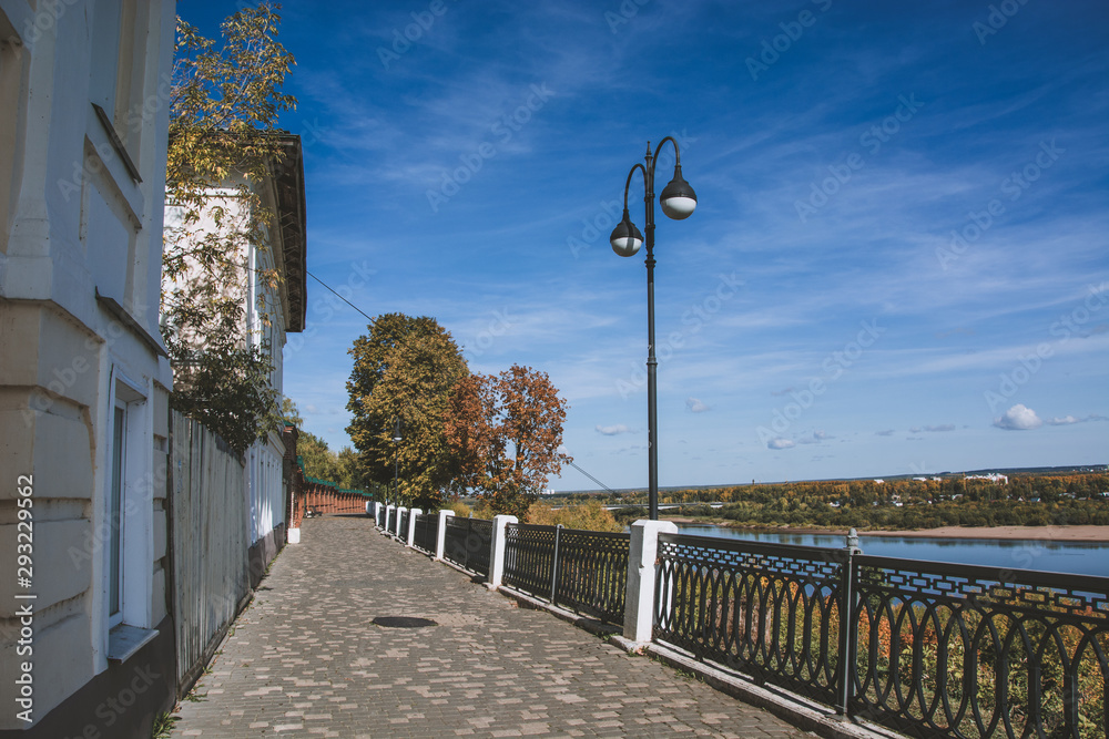 Empty quay of the Kirov. Vyatka river. Sunny autumn day. Empty quay of the Kirov. Vyatka river. Sunny autumn day.