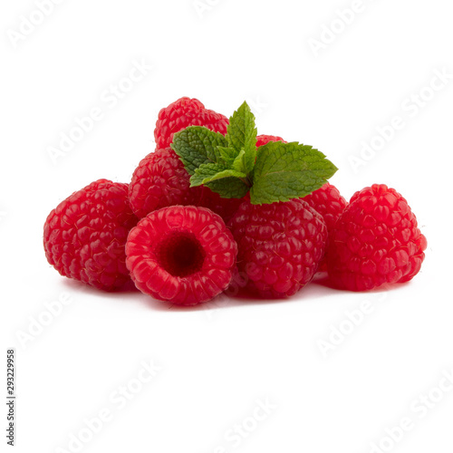 Isolated berries. Composition of red raspberries. Isolated on white background with green leaves