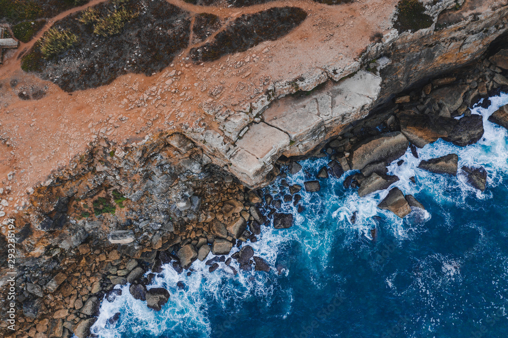 Bird eye view Atlantic ocean Portugal Peniche rocks and cliffs blue sea Bird eye view Atlantic ocean Portugal Peniche rocks and cliffs blue sea
