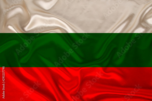 Free Download photo of the national flag of Bulgaria on a luxurious texture of satin, silk with waves, folds and highlights, closeup, copy space, concept of travel, economy and state policy, illustration - GFXLoad