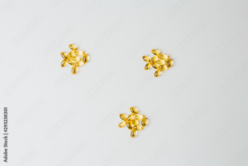 Little fish made out of yellow pills Little fish made out of yellow pills