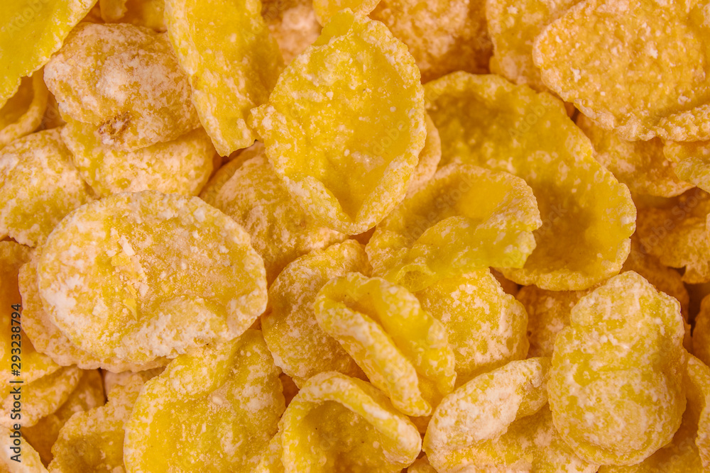 Background of the many yellow cornflakes. Healthy eating Background of the many yellow cornflakes. Healthy eating