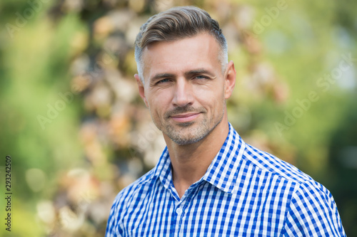Facial care and ageing. Traits and behaviors that make men more appealing. Attractive mature man. Mature guy with grey hair and bristle. Men get more attractive with age. Beauty of mature face