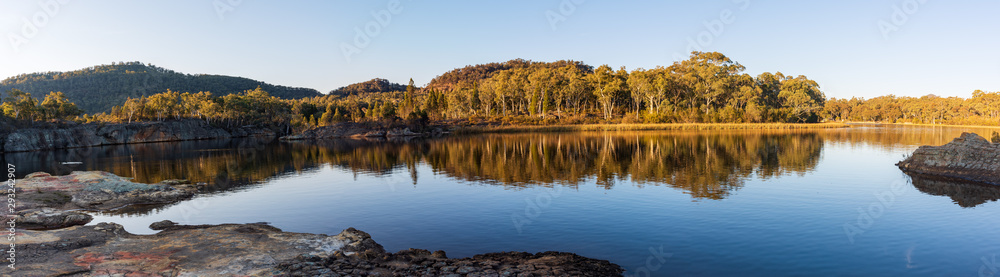 Sunset at Dunn's Swamp. Panoramas of the Australian bush over calm waters Sunset at Dunn's Swamp. Panoramas of the Australian bush over calm waters