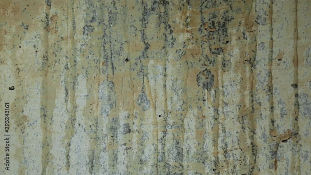 dirty water slowly dripping and flowing on a shabbyold dark concrete wall close up. bad repair concept. leakage dirty water slowly dripping and flowing on a shabbyold dark concrete wall close up. bad repair concept. leakage