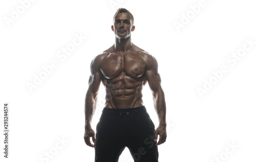 Fitness model man posing in studio © bondarchik