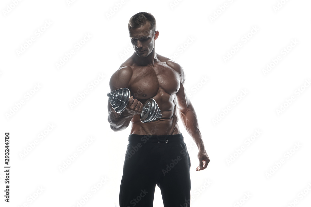 Fototapeta premium Fitness model man posing in studio