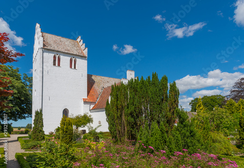 Alsted church in Denmark on a summer day photo