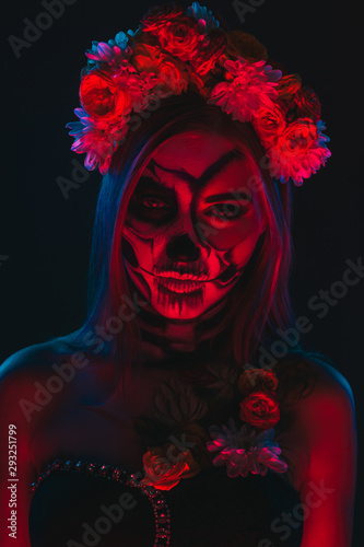 Scary woman in floral wreath