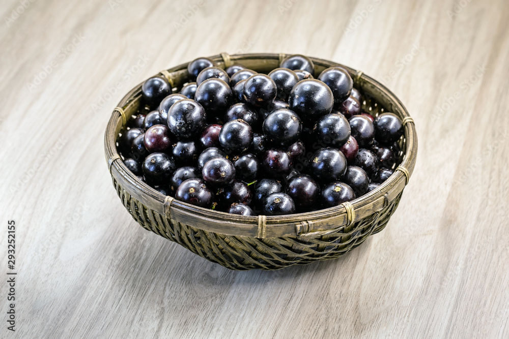 Fruit called Jaboticaba or jabuticaba in a basket on a white background, preserves organic and healthy fruits. Fruit called Jaboticaba or jabuticaba in a basket on a white background, preserves organic and healthy fruits.