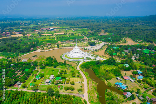Aerial view of white pagoda at Wat Sangtham wangkaokaew at Wangnamkaew ,Nakornratchasrima,Thailand