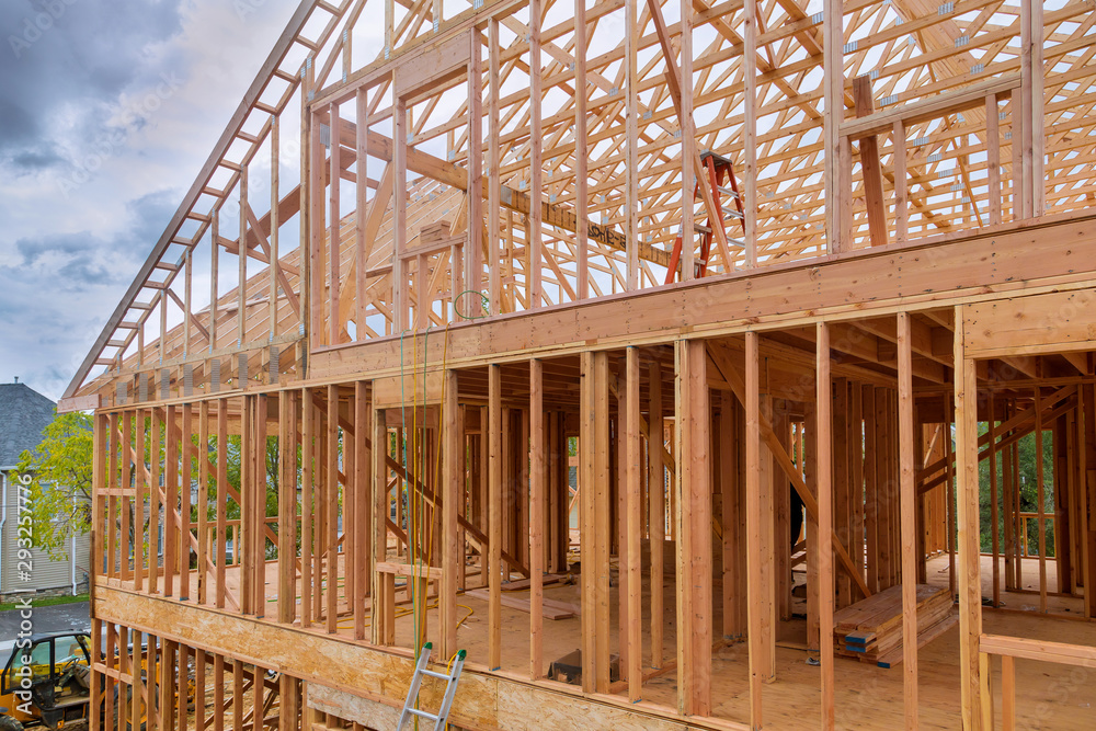 Obraz premium Beam stick built frame of a new house under construction