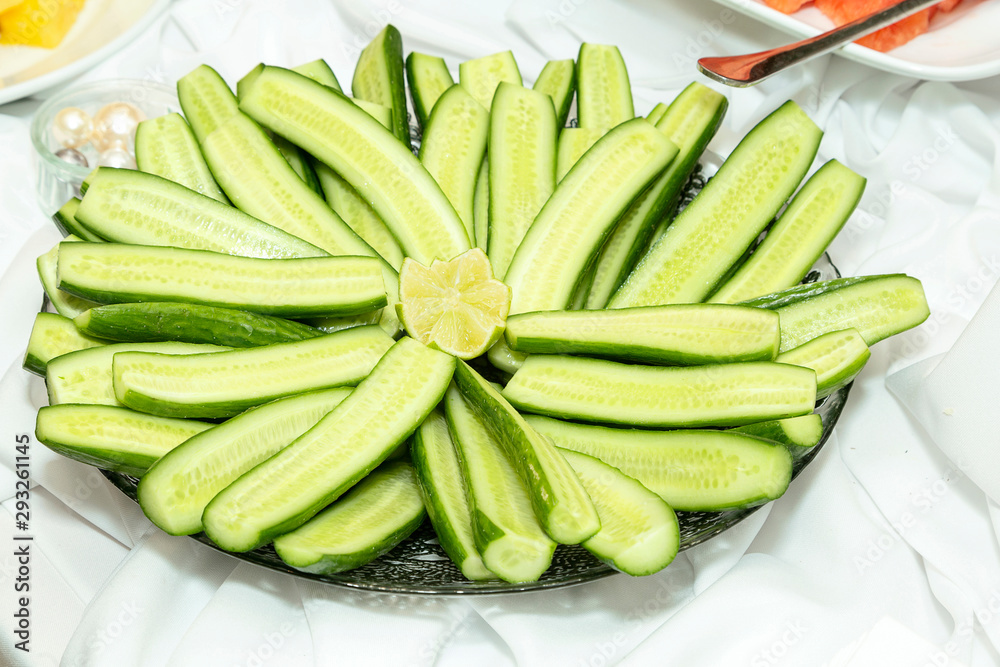 Fresh Cucumber Sliced and Displayed Fresh Cucumber Sliced and Displayed
