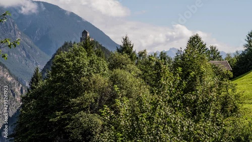 time lapse flight towards ancient castle kronburg in austria photo