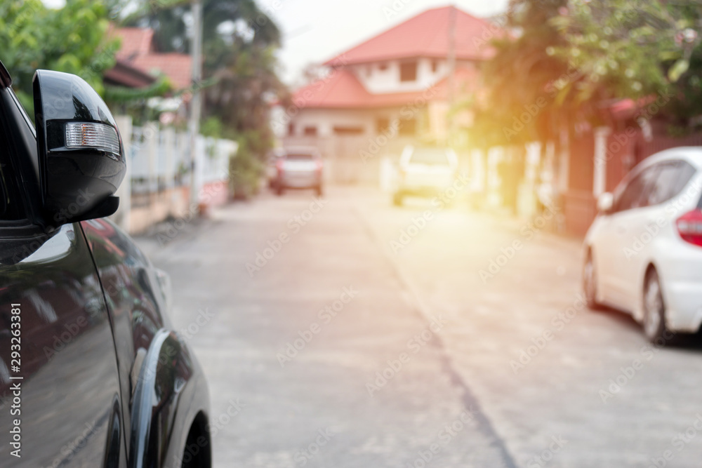 Car parking on the asphalt road. Car in the city on street. Automobile background with sunlight. Car parking on the asphalt road. Car in the city on street. Automobile background with sunlight.
