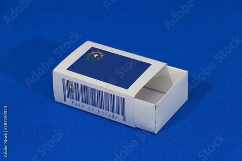 Nevada flag on white box with barcode and the color of state flag on blue background, paper packaging for put match or products.