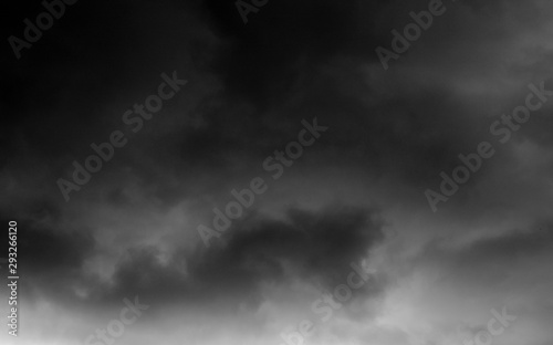 Scenery of tropical thunderstorm black cloudy sky.