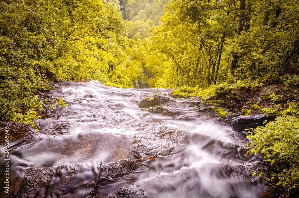 Top of Amicalola falls long exposure during the sunset in the fall season in the begining of the Appalachian trail Top of Amicalola falls long exposure during the sunset in the fall season in the begining of the Appalachian trail