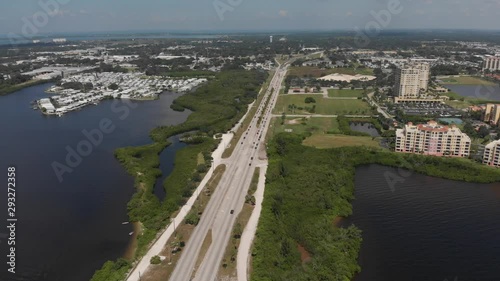 Wallpaper Mural Aerial of Route 41 heading into Palmetto, Florida.  The mouth of the Manatee River leading to the Gulf of Mexico and upscale marina and homes are visible below Torontodigital.ca